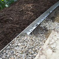 Link Edge edging separating lawn and garden bed